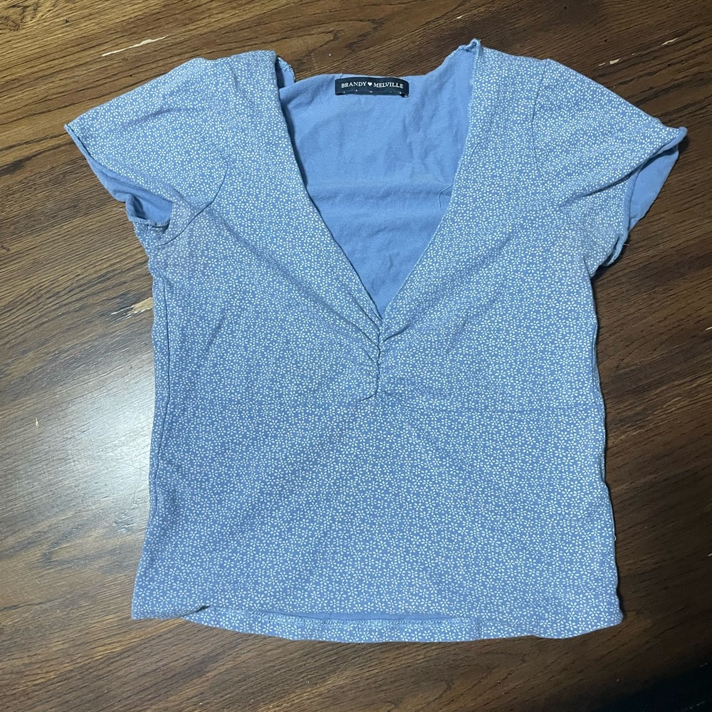 Brandy Melville size small flower print top in baby blue
